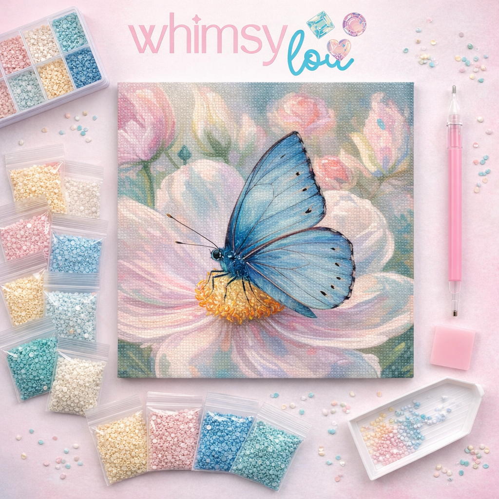 Diy art kit with blue butterfly on a flower, surrounded by colorful beads and tools, branded 'whimsy lou'.