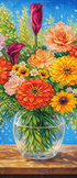 Colorful bouquet of flowers in a glass vase on a wooden surface with a blue background